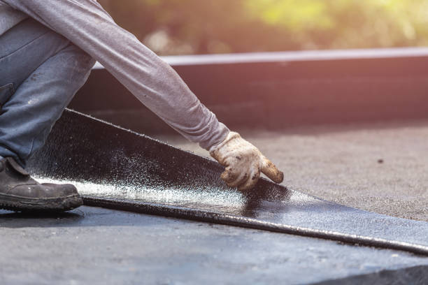 Professional Waterproofing technician working in Topeka, KS